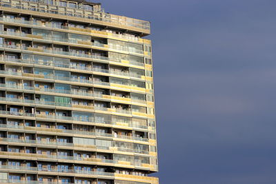 Low angle view of modern building against sky
