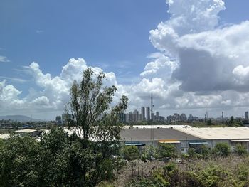 Buildings in city against sky