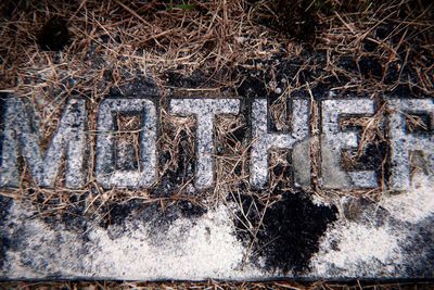 High angle view of text on snow covered land