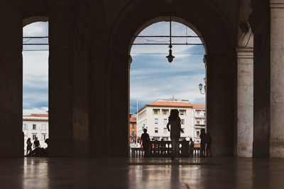 People in front of building