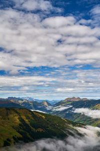 Scenic view of landscape against cloudy sky