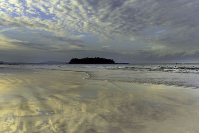 Scenic view of sea against sky at sunset