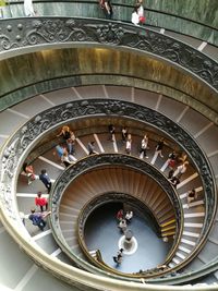 High angle view of people on spiral staircase