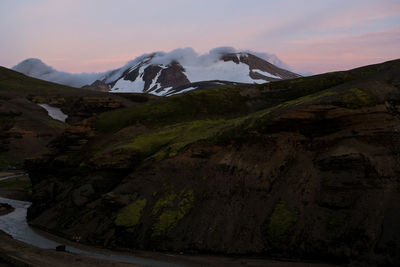Scenic view of mountains against sky during sunset