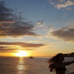 Scenic view of sea at sunset