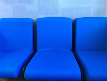 Close-up of blue seats