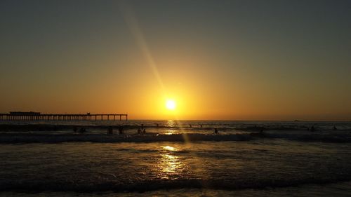 View of calm sea at sunset