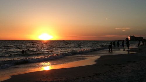 Scenic view of sea at sunset