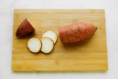 High angle view of bread on cutting board