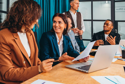 Business colleagues working at office