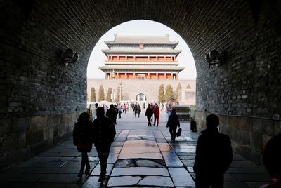 Tourists in front of historic building