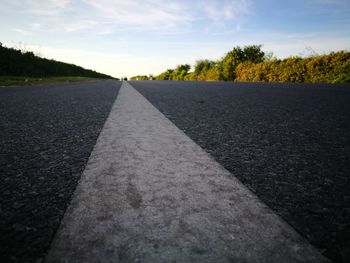 Surface level of road against sky