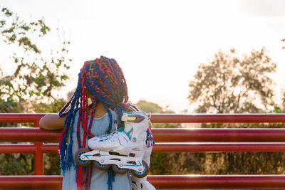 Full length of child in park against sky
