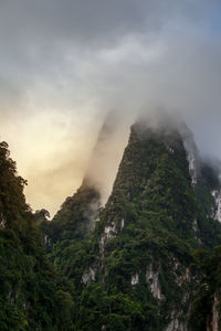 Low angle view of mountain range against sky