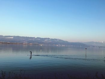 Scenic view of lake against clear sky