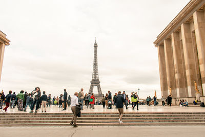 Group of people in front of historical building