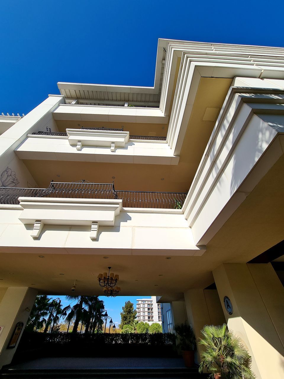 LOW ANGLE VIEW OF BUILDINGS AGAINST CLEAR SKY