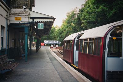 Train at railroad station in city