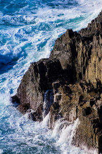 Scenic view of rocks in sea