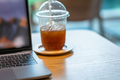 Close-up of coffee served on table