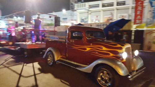 Cars on street in city at night