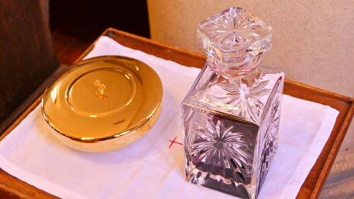 Holy water for funeral service in a religious christian or catholic chapel 

