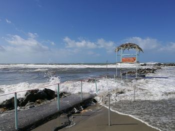 Scenic view of beach against sky