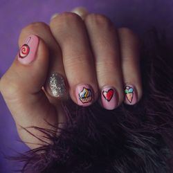 Cropped image of woman hand with nail art