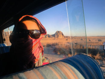 Man wearing sunglasses against sky