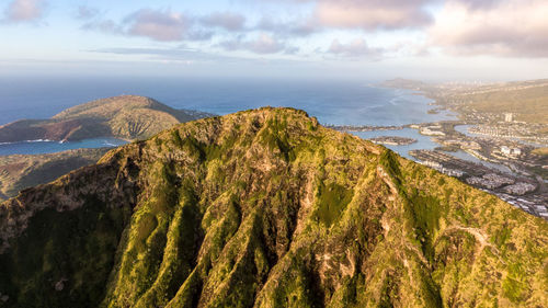 Drone sunrise view of koko head mountain with hawaii kai in the background. oahu, hawaii, usa
