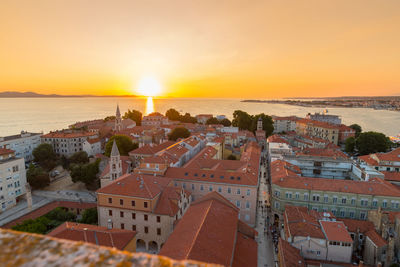 High angle view of townscape against sky during sunset