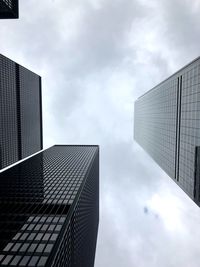 Low angle view of modern buildings against sky