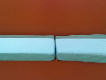 Mattress against brown background