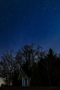 Low angle view of building against sky at night