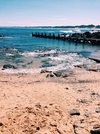 Scenic view of beach against sky
