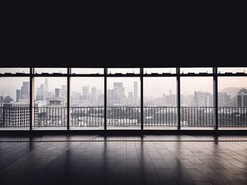 Buildings seen through glass window