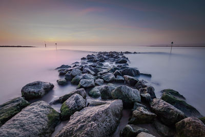 Scenic view of sea at sunset