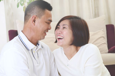 Smiling couple at home