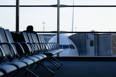 Empty chairs and tables in airport