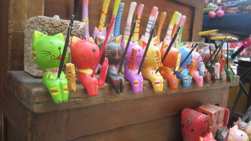 Close-up of colorful toys for sale at store