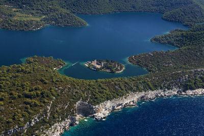 Aerial salt lakes and benedictine monastery on mljet island, adriatic sea, croatia