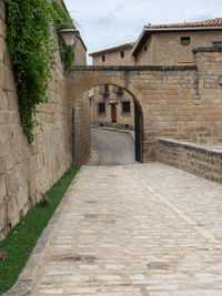 Footpath leading towards historic building