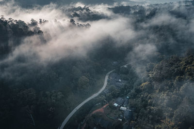 High angle view of mountain road against cloudy sky