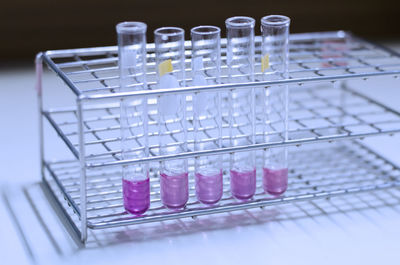 Close-up of test tubes on table