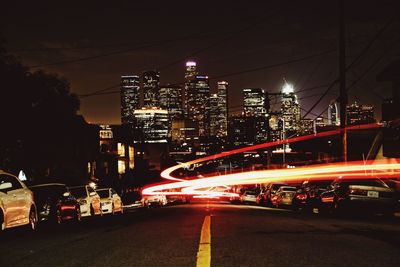 Light trails on city street at night