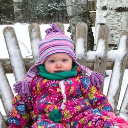 Portrait of smiling boy in snow