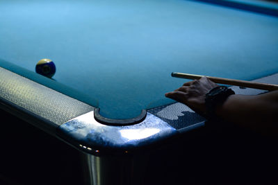 High angle view of person playing on table