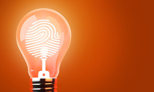 Close-up of illuminated light bulb