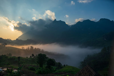 Scenic view of mountains against sky during sunset