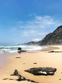 Scenic view of beach against sky